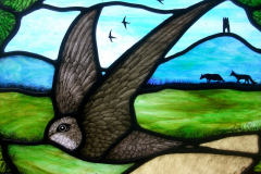 Swift over Tor Stained Glass